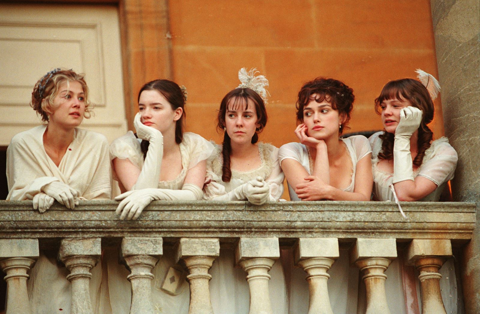 Scene from Pride and Prejudice (2005) girls in dresses on the balcony
